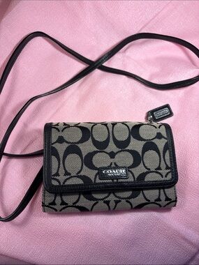 Like New - Coach Black and Tan Signature Canvas Crossbody Wallet